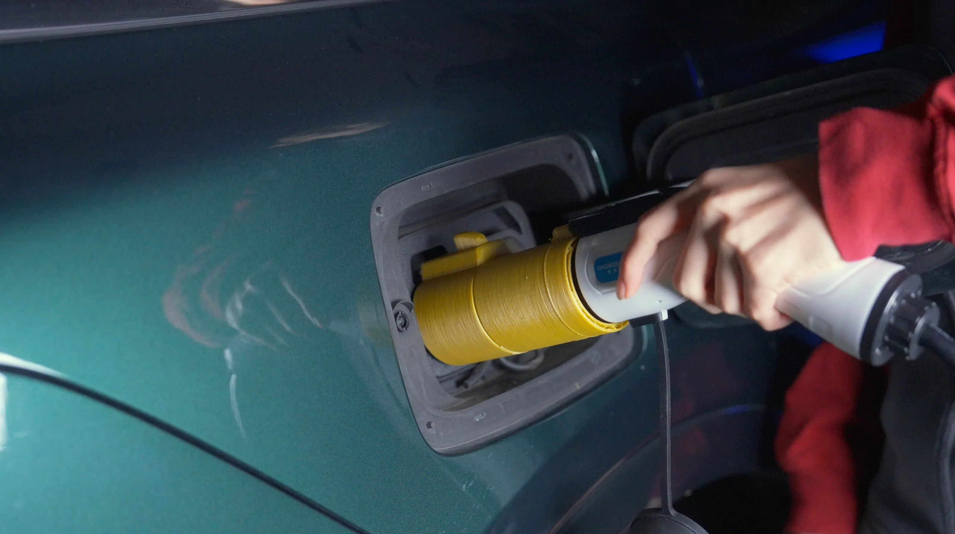 The charger terminal, being used on a car